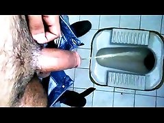 Indian Big Cock Pees in Public Washroom