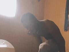 Take a cool shower with black African boy